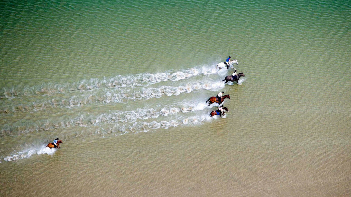 EXPLORE__Horse Riding __Aerial view of beach horse riding on Bertra Beach Co master
