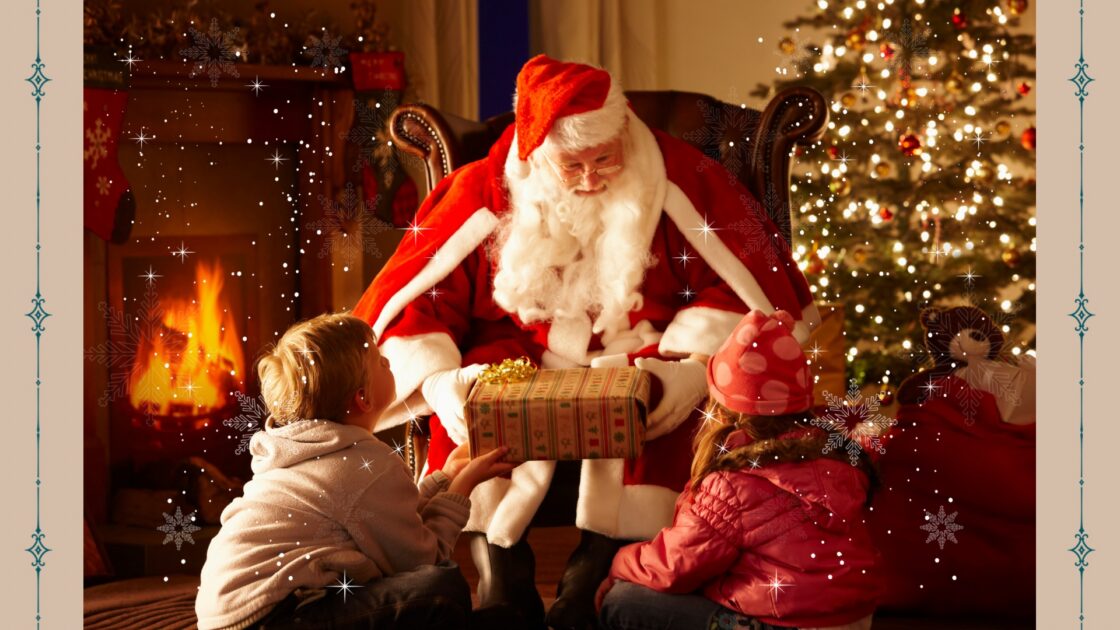 Santa Claus with two children by a cosy fireplace and lit Christmas tree, exchanging gifts in a festive hotel setting.